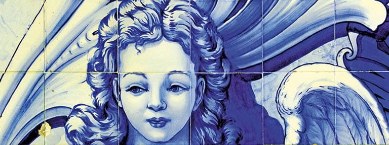 Traditional ceramic tiles depicting an angel in blue and white in Lamego, Portugal